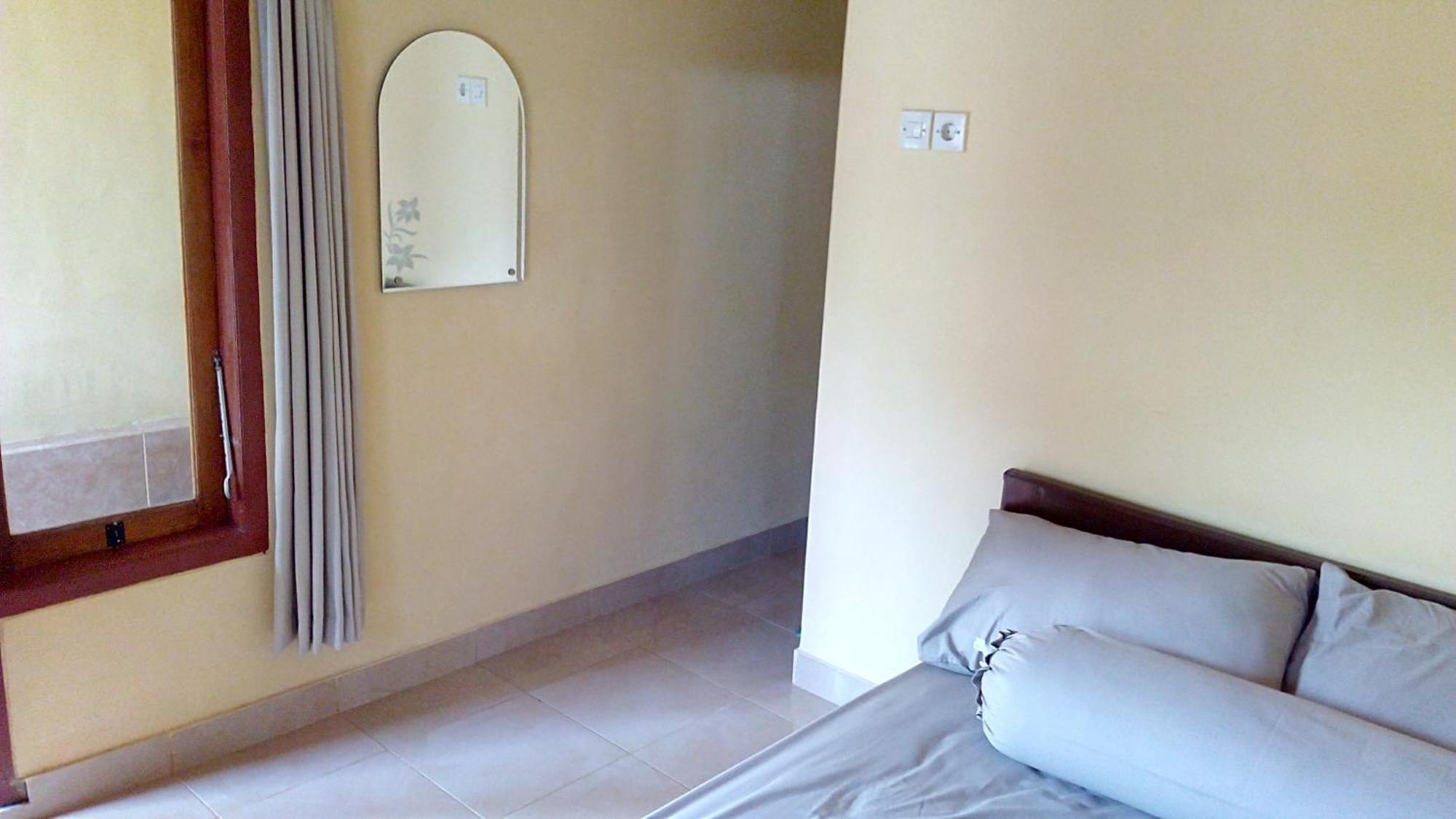 Radiya Guesthouse ซัมบาลัง ลาวัง ห้อง รูปภาพ